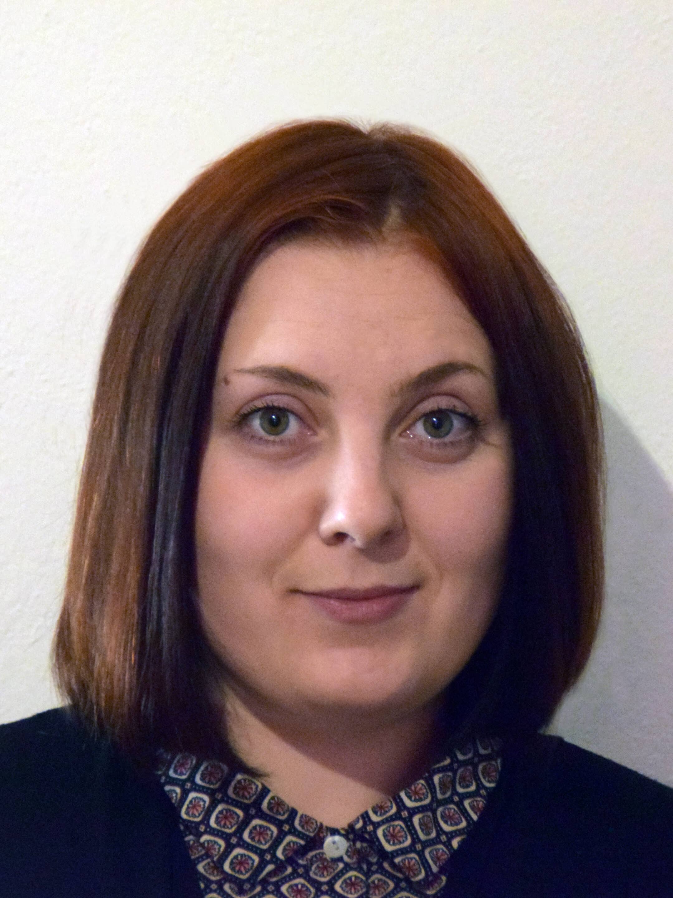 Liliia Knysh mit Karpfen